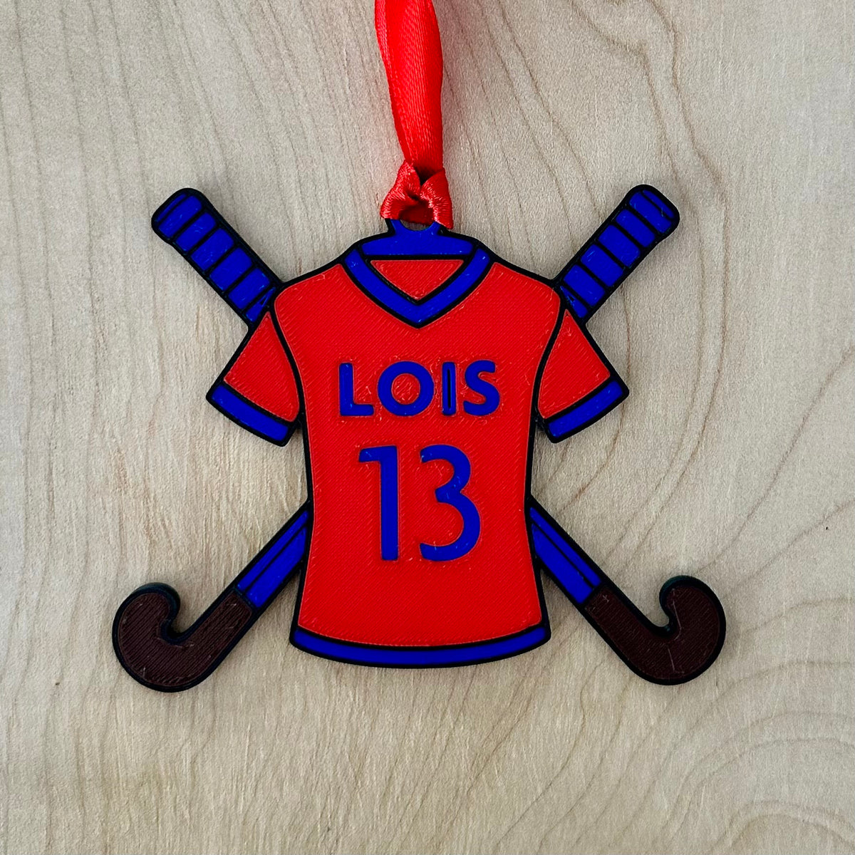 Personalised field hockey shirt Christmas decoration with ribbon